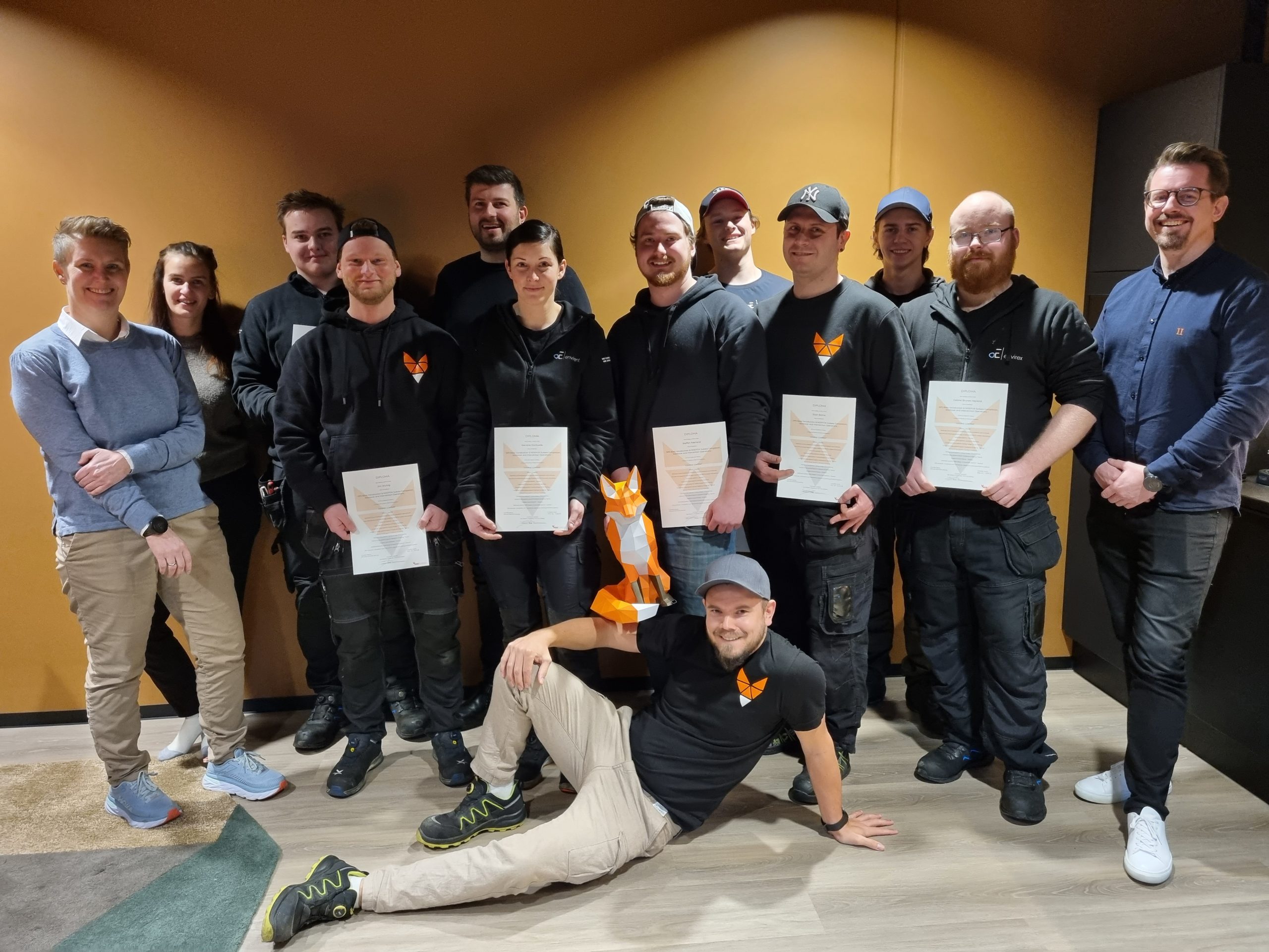 A group of Field Specialists receiving their course diplomas